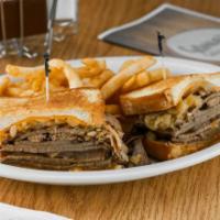 Grilled Ortega Beef Melt Sandwich · High stack roast beef with melted jack, grilled onions, chopped Ortega peppers and 1,000 Isl...