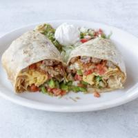 California Burrito · Large flour tortilla filled with fries, steak, guacamole, sour cream and cream. Filled with ...