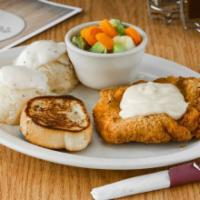 Chicken Fried Steak · An 8 oz. tender steak breaded and deep-fried to a golden brown, topped with country gravy an...