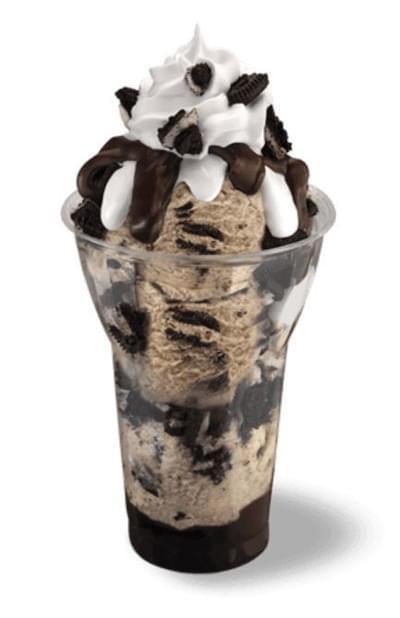 Oreo Layered Sundae · 3 scoops of our Oreo cookies 'n cream ice cream layered with hot fudge and chopped Oreo cookie pieces topped with marshmallow, more hot fudge and Oreo cookie pieces.