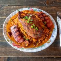 Jambalaya · Seasoned rice with chicken and andouille sausage in a spicy creole tomato gravy.