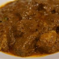 Beef Curry · Beef with Indian mild spices, garam masala, olive oil, ginger, onion and garlic. Comes with ...