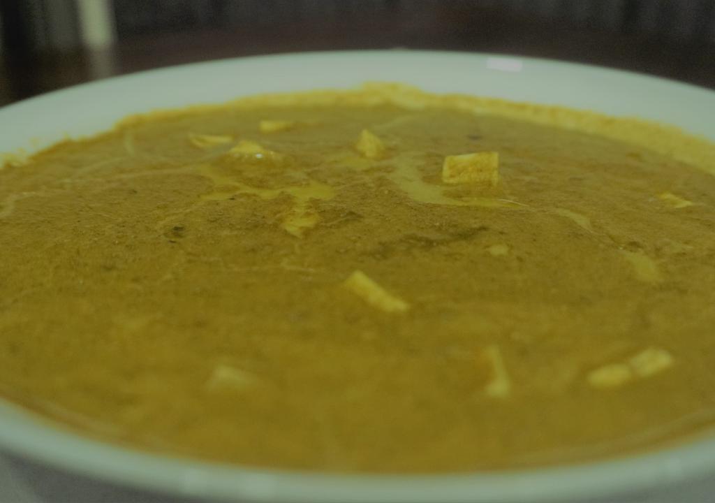 Saag Paneer · Indian cheese with spinach, onion, tomato paste and mild spices. Comes with rice and naan.