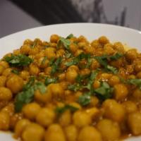 Channa Masala · Chickpeas, garam masala, tomato paste, garlic, lemon, ginger and butter. Comes with a side o...