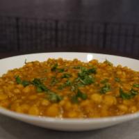 Dhal · Lentil based, comes with a side of basmati rice or naan.