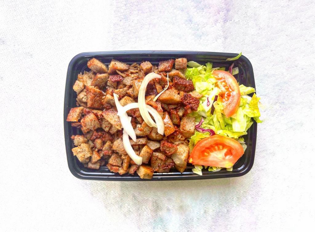 Lamb over Rice · Comes With Aromatic Basmati Rice, Grilled Lamb, Grilled Onion, Green
pepper, Cilantro, Salad (Lettuce, Red Cabbage & Tomato) and Sauce (White, Hot, Green & BBQ)