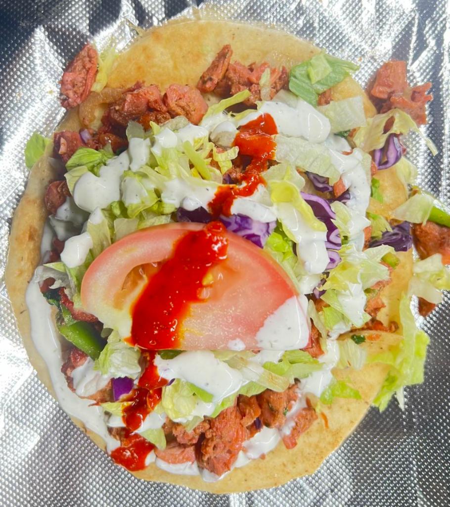 Combo Gyro/Sandwich · Comes With Toasted Pita Bread, Grilled Chicken and Lamb, Grilled Onion,
Green pepper, Cilantro, Salad (Lettuce, Red Cabbage & Tomato), and Sauce (White, Hot,
Green & BBQ)