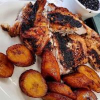 1/2 (D.M) charcoal Grilled Chicken, 2 S.D · 2 legs & 2 thighs, served with 2 side dishes of your choice. (Dark Meat only)