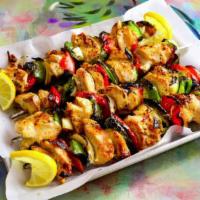 Grilled Chicken Shish-Kebab · With two sides.