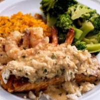 Blackened Salmon and Shrimp Platter · Comes with garlic crab butter over yellow rice with a side of broccoli.