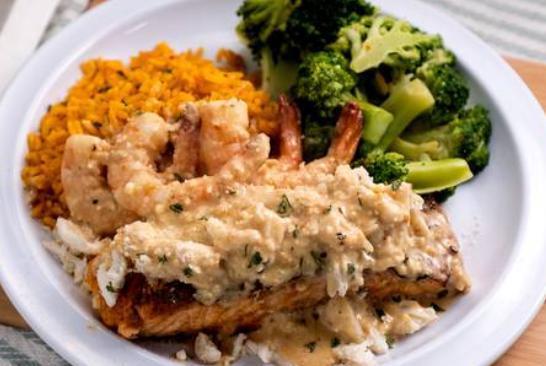 Blackened Salmon and Shrimp Platter · Comes with garlic crab butter over yellow rice with a side of broccoli.