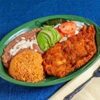Milanesa de Pollo · Tender chicken breast nicely breaded pan fried, served with rice and Mexican salad.