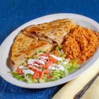 Summer Quesadilla · Yummy quesadilla made with cheese, grilled chicken and chunks of pineapple.