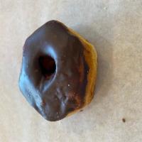 Chocolate Frosted Donut · Raised donut dipped in milk chocolate