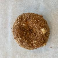 Butternut Donut · Cake donut coated in glaze then dipped in cinnamon cake crumbles
