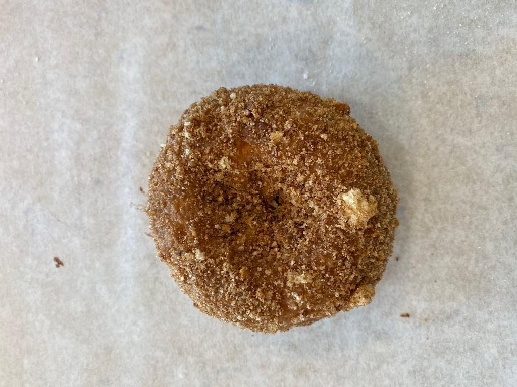 Butternut Donut · Cake donut coated in glaze then dipped in cinnamon cake crumbles