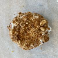 Sid's Special · Raised donut topped with vanilla cream and cinnamon cake crumbles and filled with blueberry ...