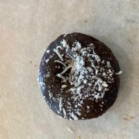 Chocolate Coconut Donut · Chocolate cake donut dipped in milk chocolate then covered in coconut