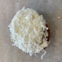 Coconut Cream · Raised donut topped with vanilla cream and coconut, and filled with Bavarian cream