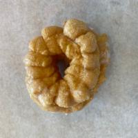 French Cruller · Fluffy twisted dough shaped into a ring and covered in glaze