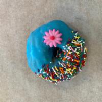 Blue Eyes Donut · Raised donut dipped in blue (vanilla) frosting and coated with sprinkles