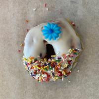Vanilla Frosted Donut · Raised donut dipped in vanilla frosting and topped with sprinkles