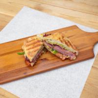 Panini Hot Sandwich · Choice of chicken, pastrami, turkey, roast beef, or ham with spinach, tomato, bell pepper, o...