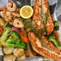 Seafood Combo (grilled) · 1/2 lb. salmon, 8 pieces of shrimp, 6 pieces of scallop and mix vegetables ( Onion, Potato, ...