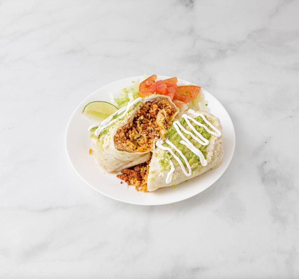 Pruebe Nuestro Ricos Burrito · Flour tortilla choice of meat stuffed with rice, beans, onion, tomato and cilantro topped with ceam, queso fresco and guacamole.