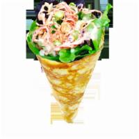 23. Spicy Crabmeat Crepe · Crabmeat sticks, Mesclun Mix, Masago, Seaweed Salad, Cucumbers, Edamame (Soy Beans), Crunchy...