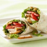 Chicken Gyro · Chicken, spicy garlic sauce tomatoes, onions, lettuce, topped with an olive on pita bread.