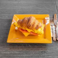 The Wall Street Sandwich · 3 farm fresh eggs, tomato, choice of cheese on a toasted croissant. This is our most popular...