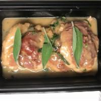 Saltimbocca · Veal scallopine, sherry wine sauce, sage, prosciutto, over sauteed spinach.