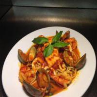 Frutti di Mare · Spaghetti, shrimp, clams, calamari, seasoned fish cherry tomatoes, fresh herbs in a light to...
