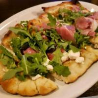 Fig Flat Bread · Fig jam, goat cheese, prosciutto and arugula.