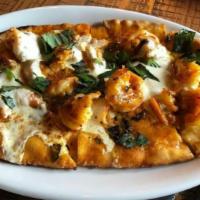 Tequila Shrimp Flat Bread · Topped with shrimp and our signature spicy tequila sauce.