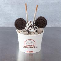 Cookie N' Cream Ice Cream Roll · Vanilla ice cream mix in with oreos, topped with whipped cream, Oreos, cookies and cream poc...