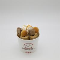 Coffee Lover Ice Cream Roll · Coffee ice cream, topped with whipped cream, coffee wafer pieces, nila wafer cookies, and ca...