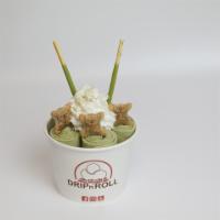 Matcha Blisss Ice Cream Roll · Matcha ice cream, topped with whipped cream, koala bear cookies, and matcha pocky sticks.
