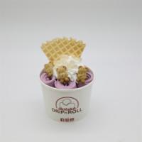 Taro-Taro Ice Cream Roll · Taro ice cream, topped with whipped  cream, teddy grahams, waffle piece, and lychee popping 