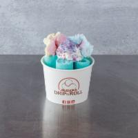 Cotton Candy Ice Cream Roll · Cotton candy ice cream, topped with whipped cream, cotton candy and cotton candy sprinkles.