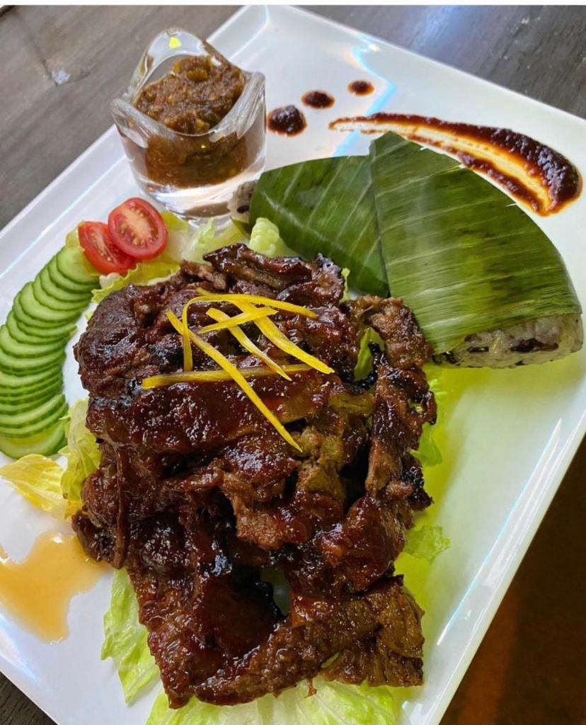 Crying Tiger · Northeastern style Thai steak grilled marinated steak with Topaz special chili sauce served with sticky rice.