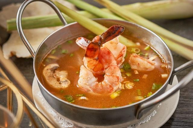 Tom Yum Shrimp Soup · The most famous traditional Thai spicy and sour soup, with Thai herbs, lemongrass, onion, chili, and mushroom.