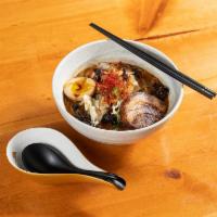 Spicy Miso Ramen · The original pork broth with Japanese miso paste, special blend of hot spices, served with c...