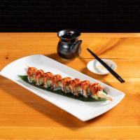 The Shrimpy Roll · Shrimp tempura and cucumber on the inside topped with spicy tuna and eel sauce.