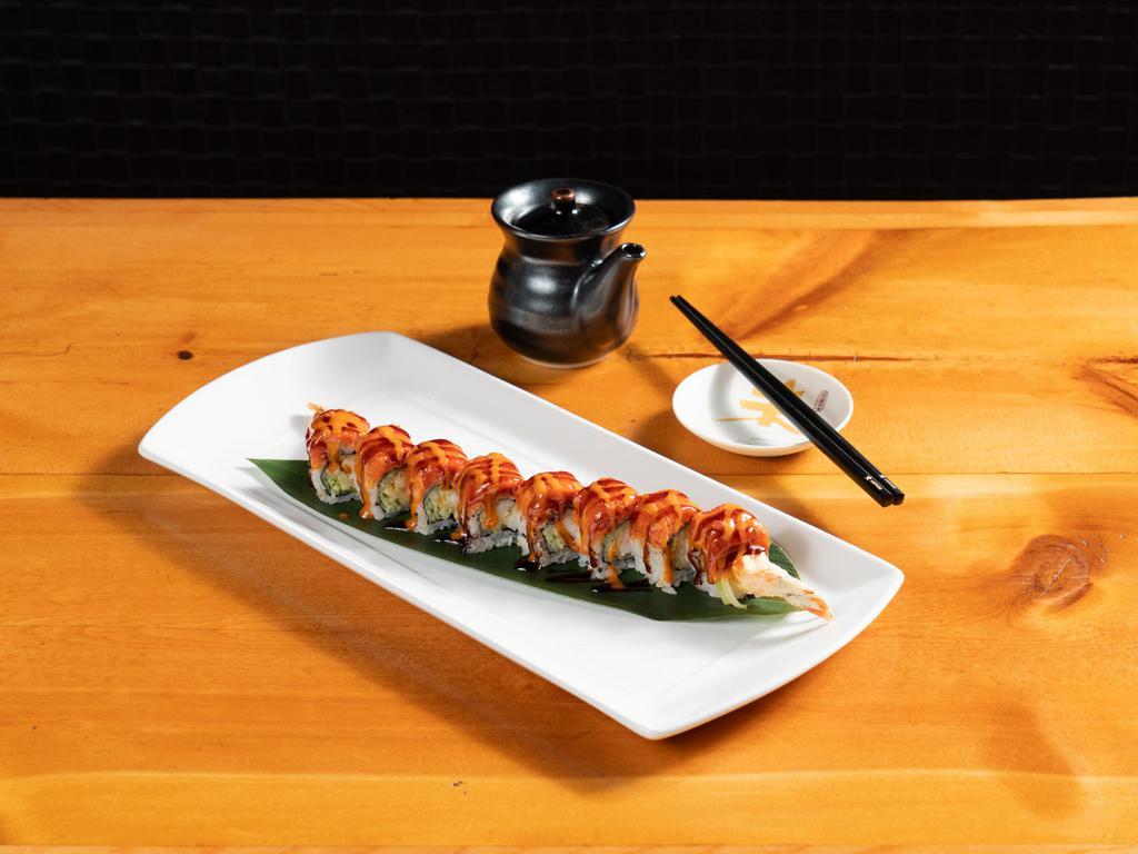 The Shrimpy Roll · Shrimp tempura and cucumber on the inside topped with spicy tuna and eel sauce.