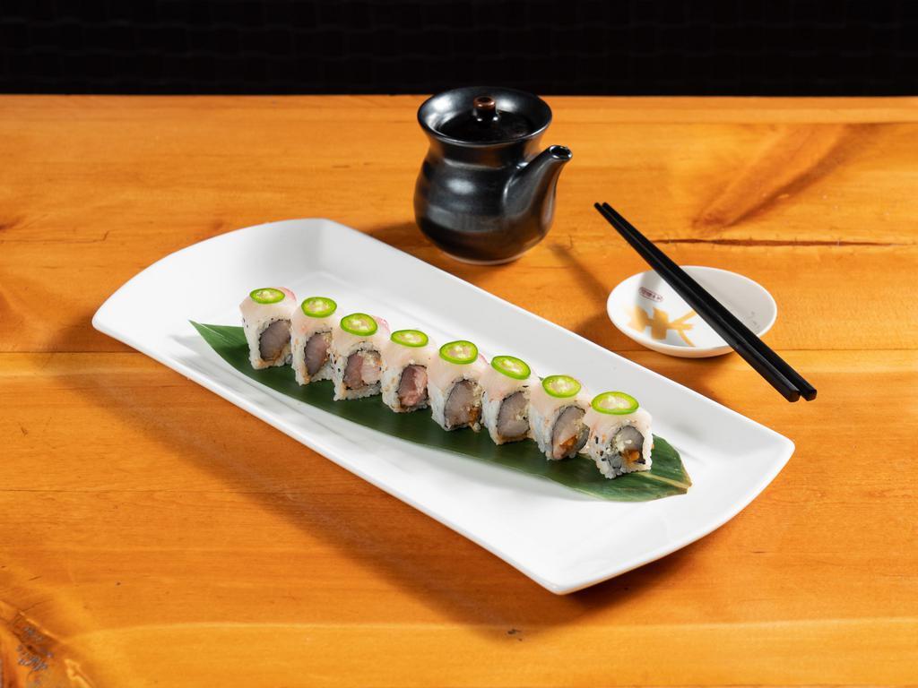 The Firecraker Roll · Crunchy spicy yellowtail topped with yellowtail jalapeno.