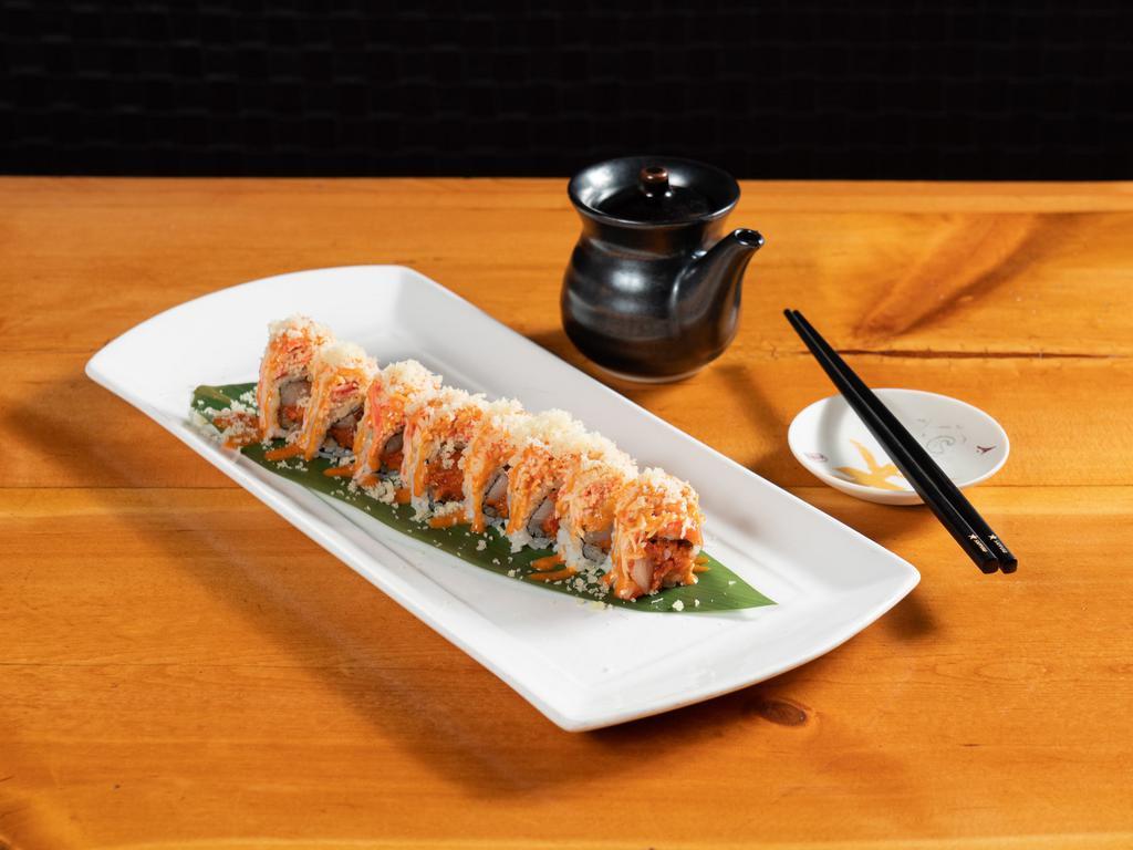 The Blast Roll · Spicy crunchy tuna and yellowtail on the inside, topped with spicy crunchy crab meat.