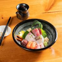 Chirashi · 12 pieces of assorted of fish over seasoned rice.