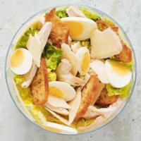 Chicken Caesar Salad · Parmesan, croutons, romaine lettuce, free-range egg, and Caesar sauce.